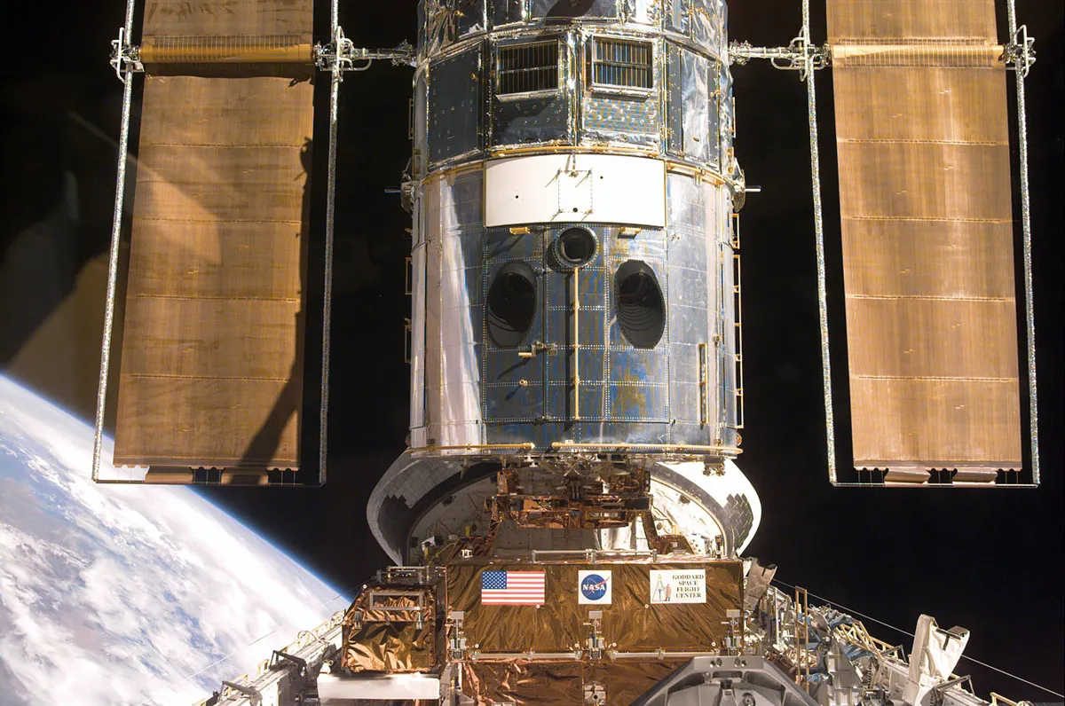 The Hubble Space Telescope berthed in Space Shuttle Discovery's bay. Credit: NASA/ESA