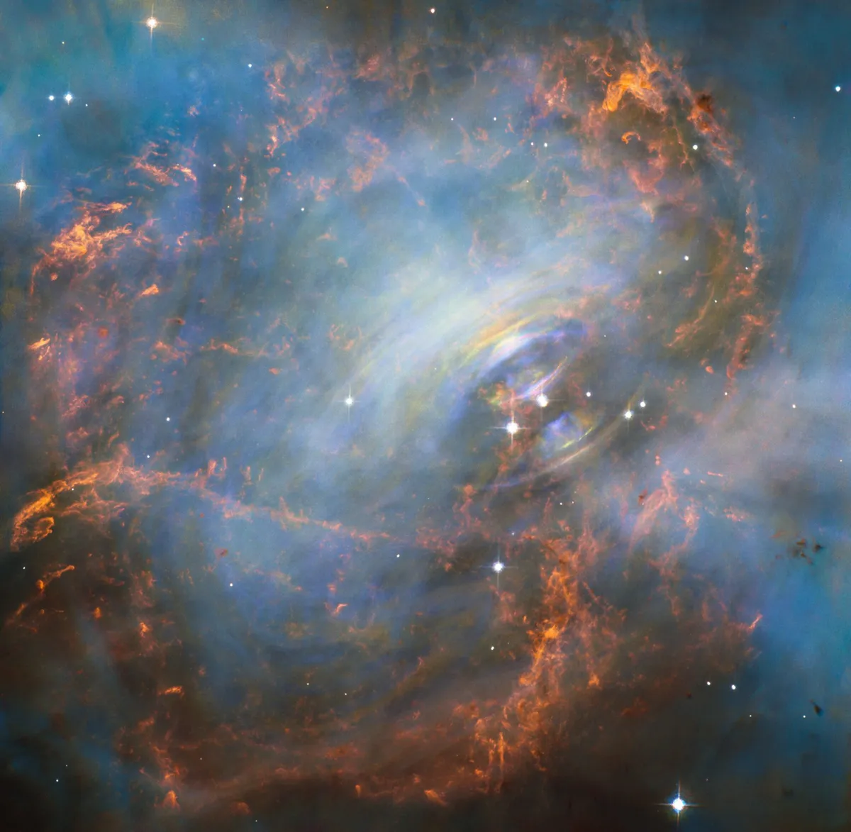 A pulsar lies at the very heart of the Crab Nebula, seen in this image captured by the Hubble Space Telescope. Credit: NASA and ESA; Acknowledgment: J. Hester (ASU) and M. Weisskopf (NASA/MSFC)