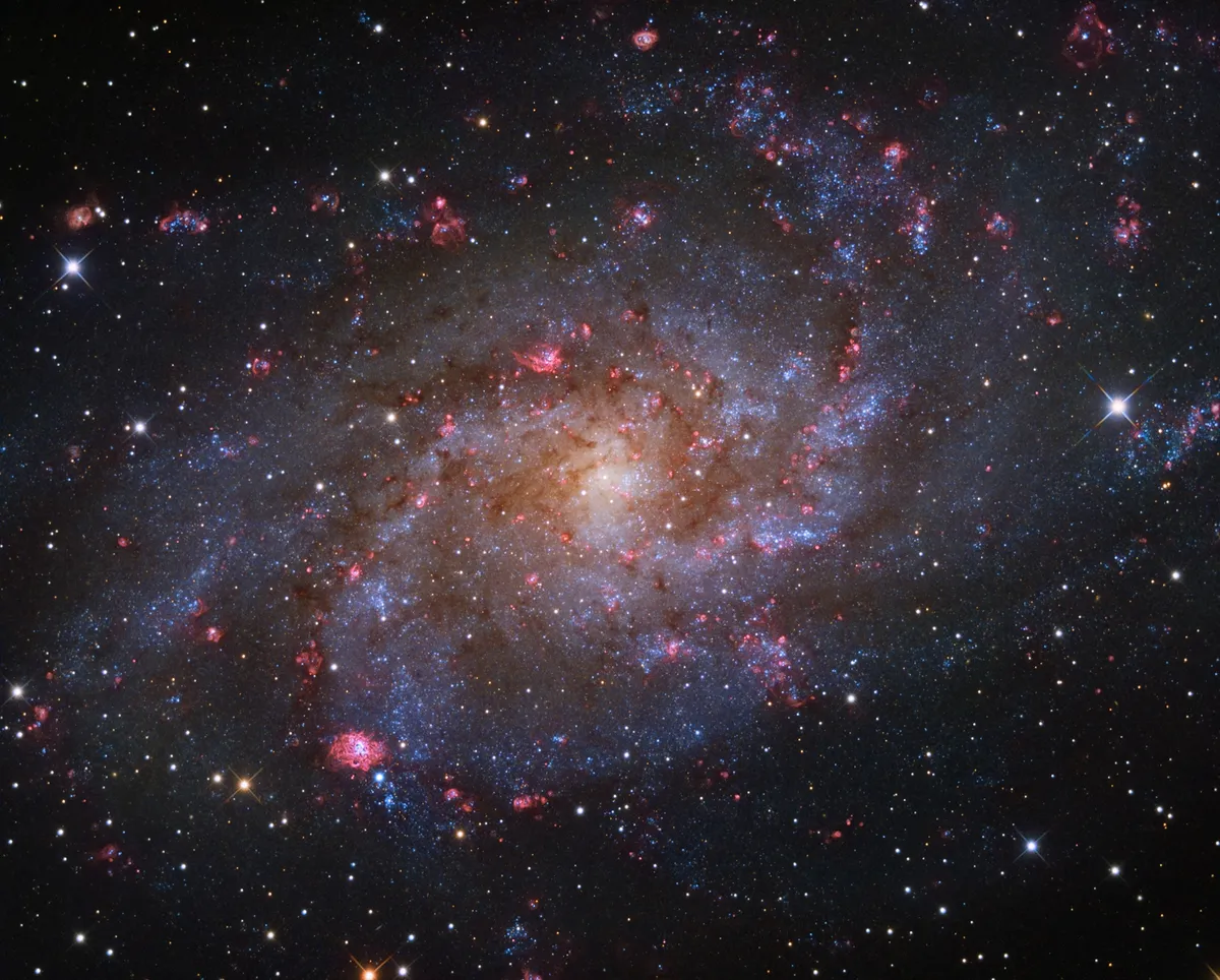 M33: The Triangulum Galaxy Rui Liao (China). Category: Galaxies. Equipment: GSO RC8 telescope at f/5.4 (with CCDT67 focal reducer), Sky-Watcher EQ8 mount, Atik One 6.0 camera, Ha-L-RGB composite, 26.5 hours total exposure.