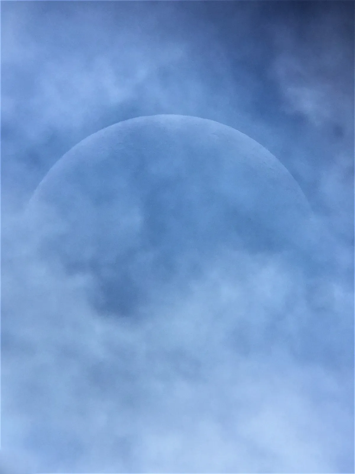 Clouds Across The Moon Casper Kentish (UK). Category: Young Astronomy Photographer of the Year. Equipment: Skywatcher 200P telescope, super 25 wide angel lens, Dobsonian mount, Apple iPad camera, 3.3mm f/2.4 lens.