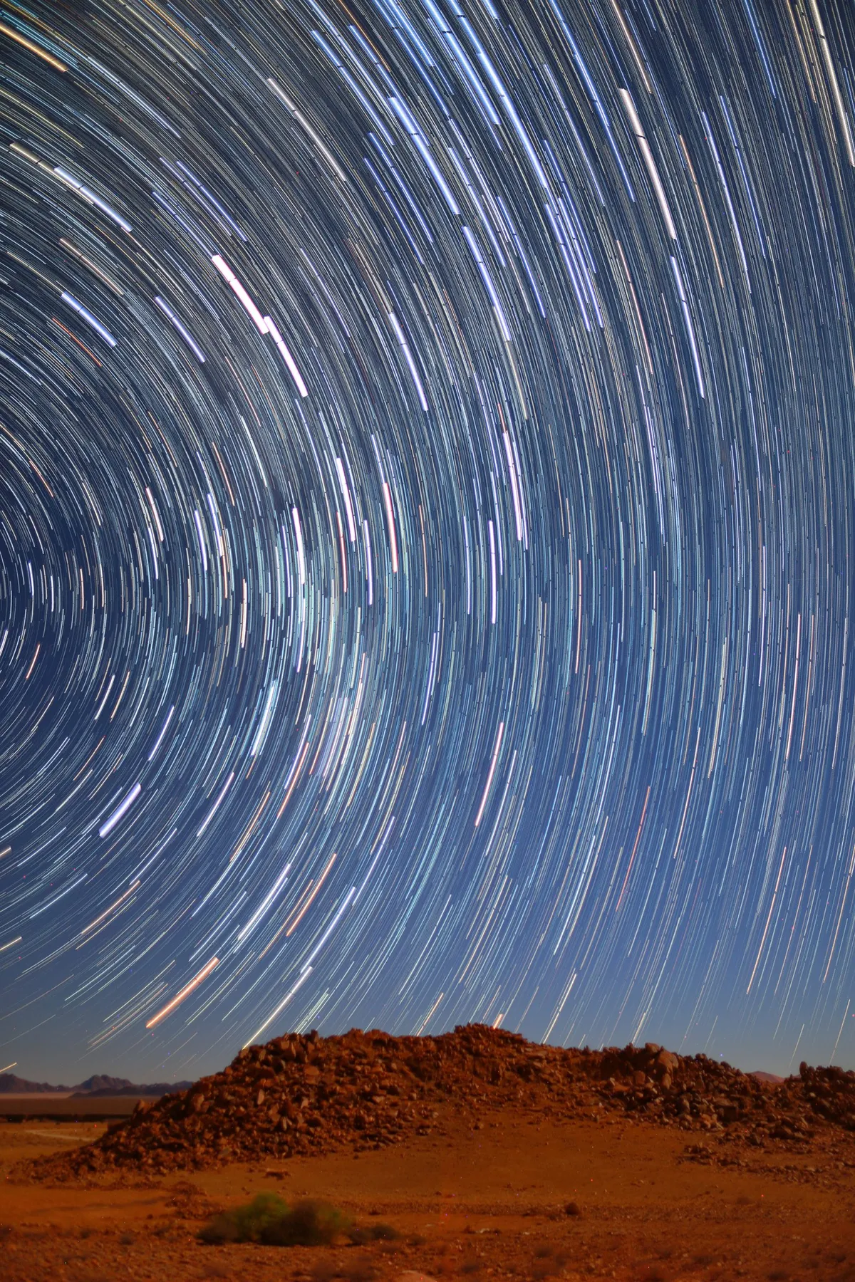 Startrails in Namib Desert Qiqige (Nina) Zhao (Australia). Category: Young Astronomy Photographer of the Year. Equipment:Canon EOS 6D camera, 24 mm f/1.6 lens, ISO 500, 20-second exposure.