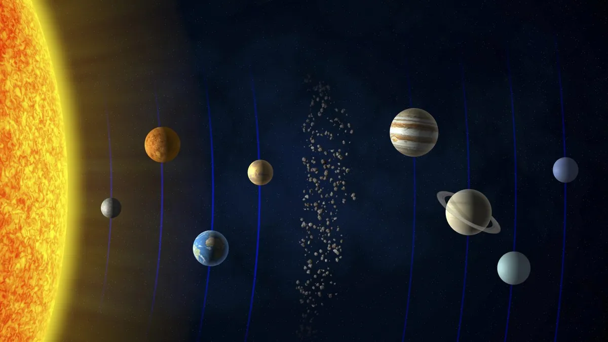 Artist's impression of the Solar System, with the asteroid belt pictured between the orbits of Mars and Jupiter. Credit: Andrzej Wojcicki / Getty Images