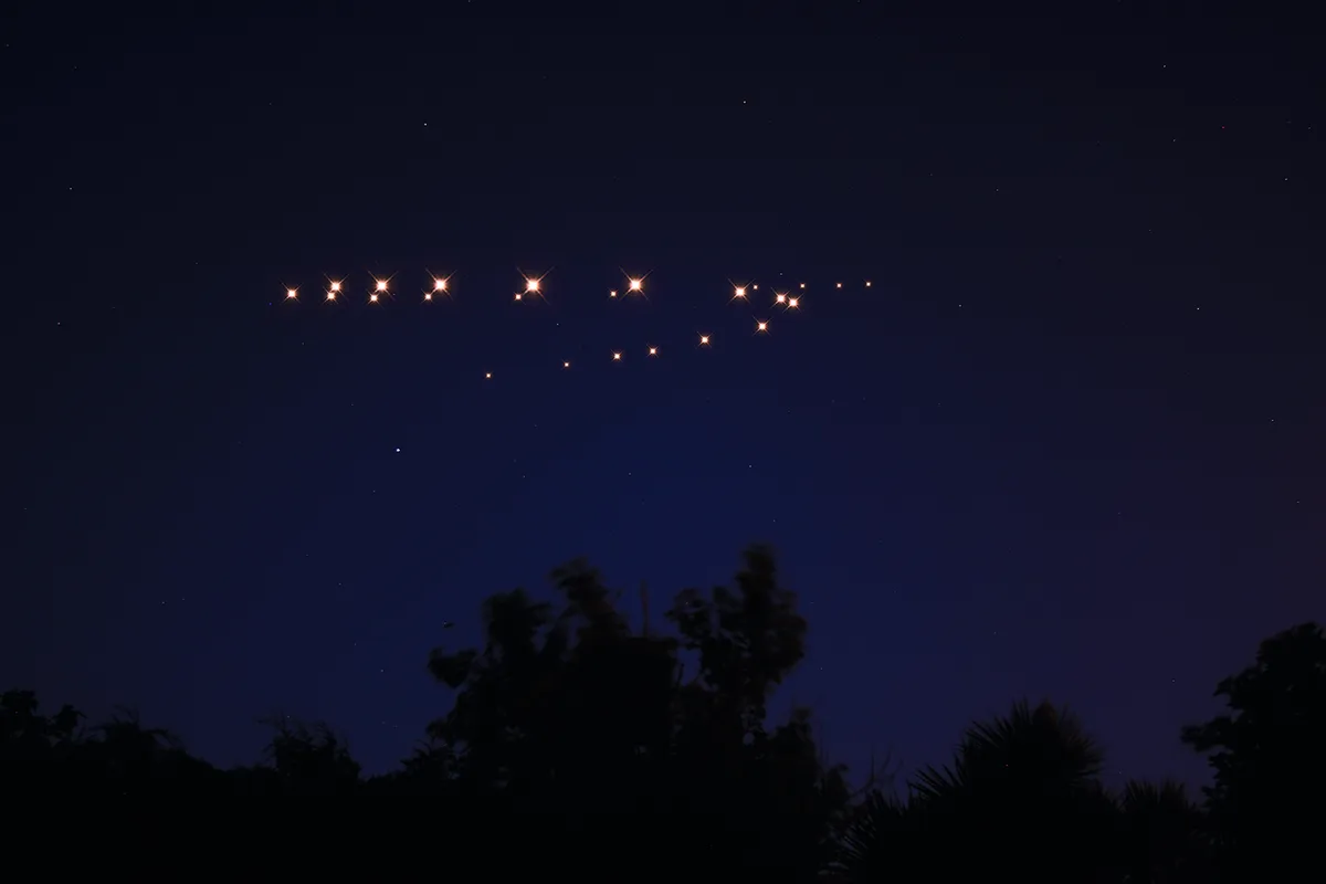 A composite image showing the apparent reversal of Mars's movement in the night sky. Credit: Pete Lawrence