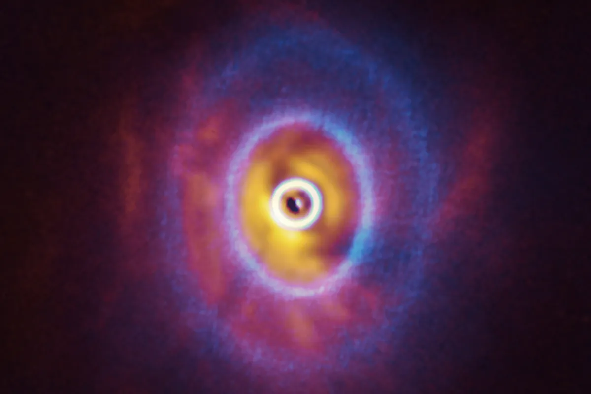 The misaligned planet-forming discs around triple star system GW Orionis. Credit: ESO/Exeter/Kraus et al., ALMA (ESO/NAOJ/NRAO)