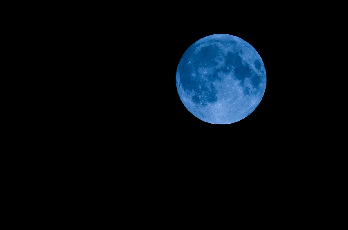 A full Moon that looks blue. Credit: PhotoAlto/Frederic Cirou/GettyImages