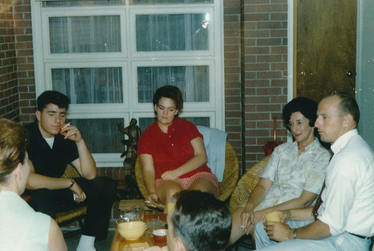 Left to right: 2) Myrtle Jenzano (facing away), Tony Jenzano, Jr., Carol Jenzano, a neighbour, Pete Conrad (Apollo 12). Credit: Carol Jenzano