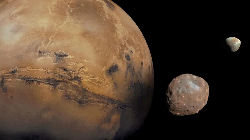 A mock-up image showing Mars and its two moons Phobos (closest to Mars) and Deimos. Credit: NASA/JPL-Caltech/GSFC/Univ. of Arizona