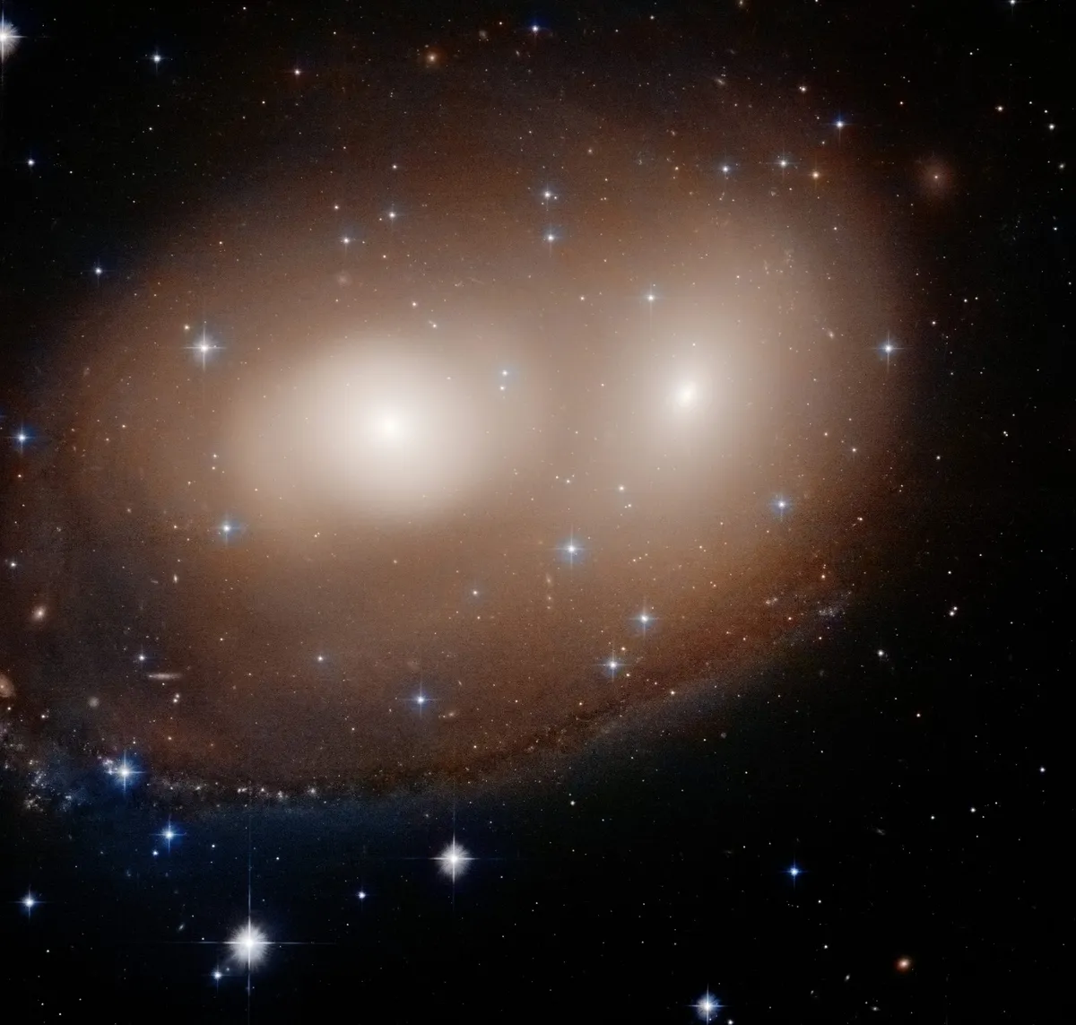 A galactic collision looking rather like a Halloween pumpkin. Credit: NASA, ESA, and W. Keel (University of Alabama)