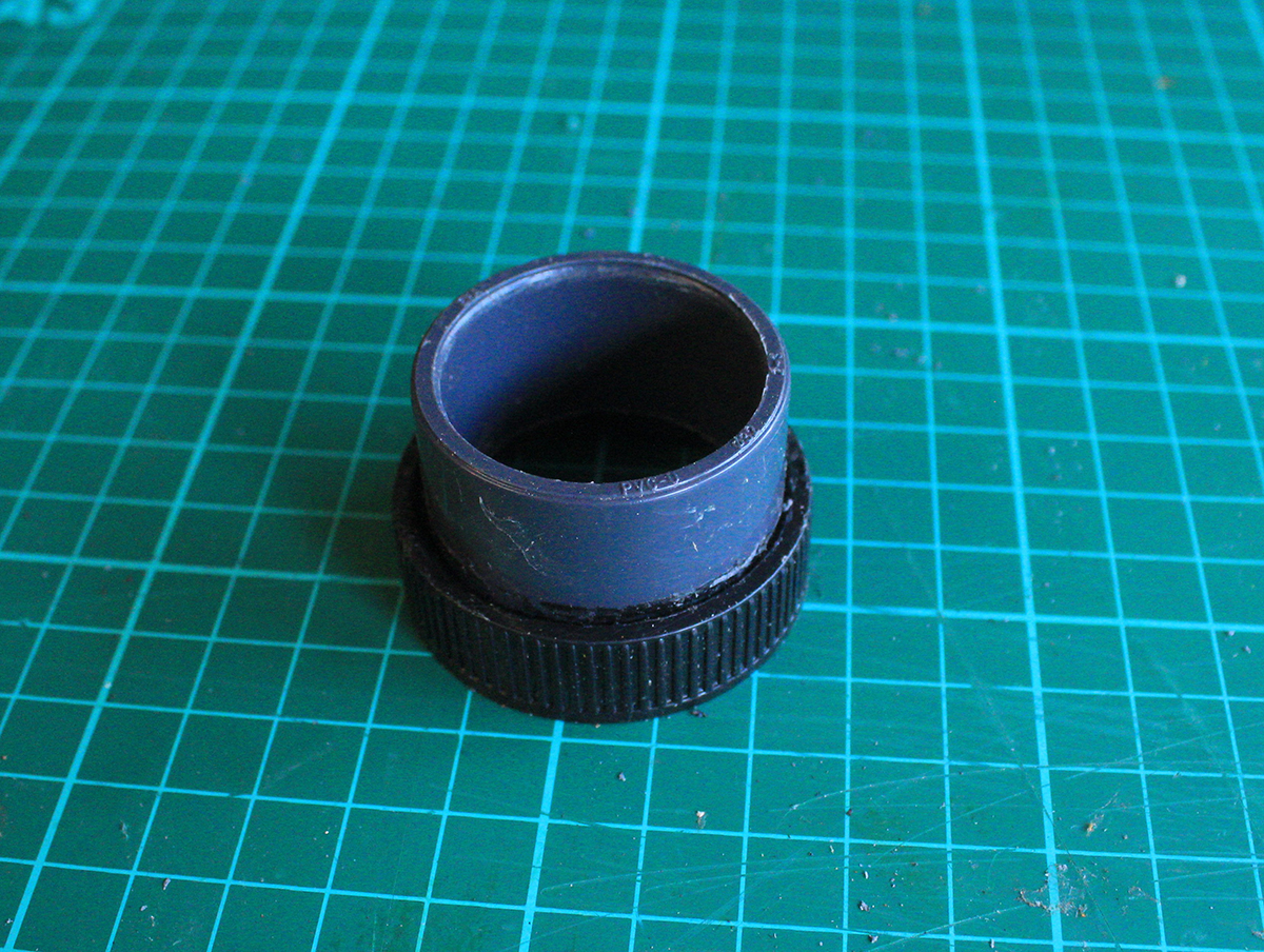 Build a guidescope using an old camera lens