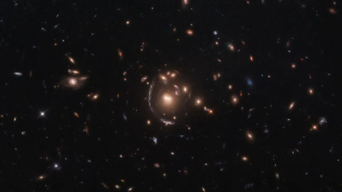 Galaxy LRG-3-817, distorted by gravitational lensing HUBBLE SPACE TELESCOPE, 9 NOVEMBER 2020. Credit: ESA/Hubble & NASA, S. Allam et al.