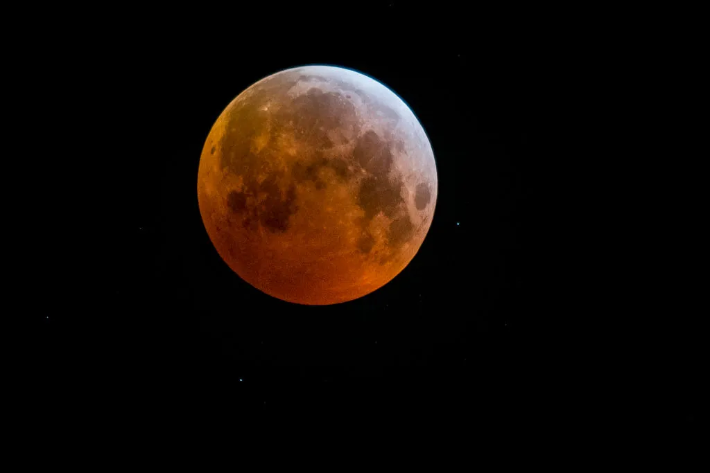 A total lunar eclipse captured from Mechelen in Belgium, 21 January 2019. Credit: JASPER JACOBS/AFP via Getty Images.
