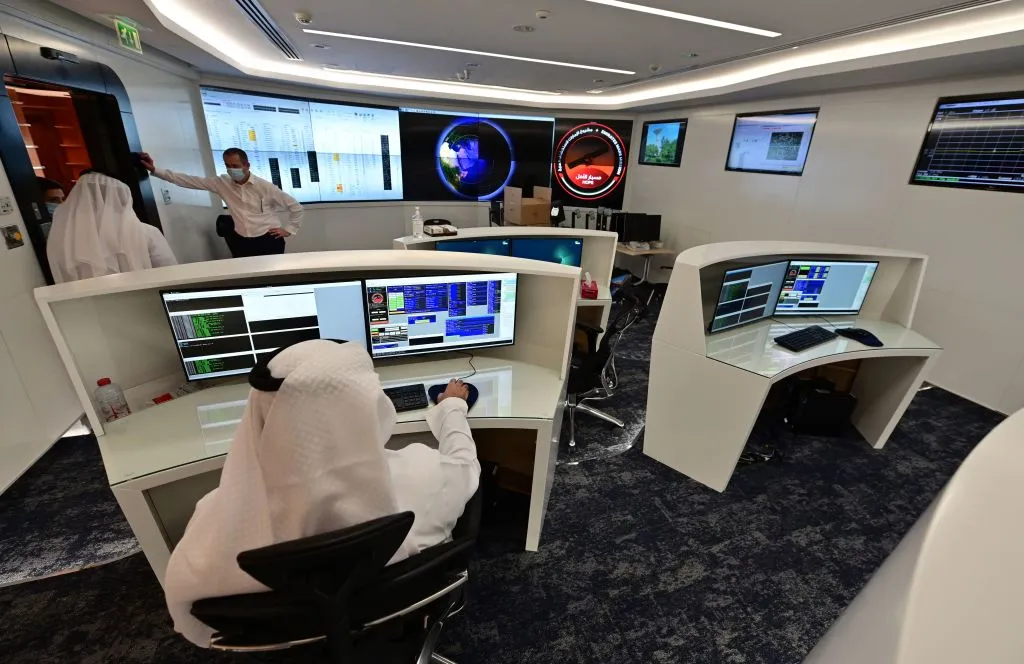 Mission scientists at the control room of the Mars Mission at the Mohammed Bin Rashid Space Centre (MBRSC), in the Gulf emirate of Dubai, July 2020. Photo by GIUSEPPE CACACE/AFP via Getty Images