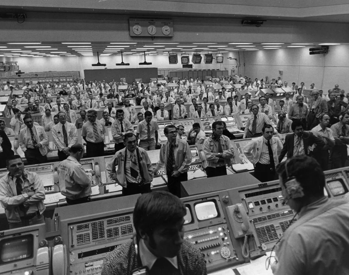 The Mission Control team anxiously follow the beginning of the Apollo 14 mission, about 15 minutes after launch. Photo by Central Press/Getty Images