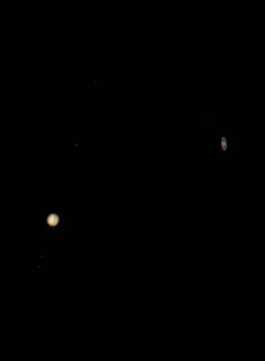 Conjunction of Jupiter and Saturn JeffreyO. Johnson, Las Cruces, New Mexico, USA, 20 December 2020 Equipment: Canon T3i DSLR, Takahashi TOA-130NFB triplet refractor, Takahashi EM200 mount