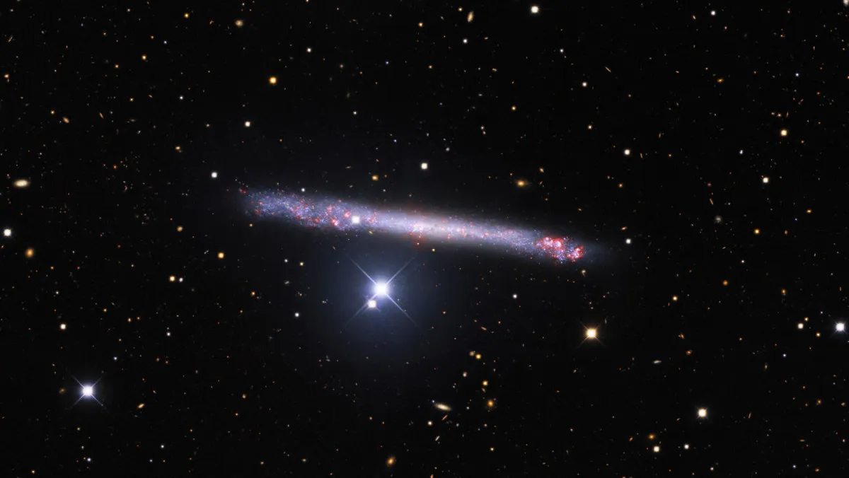 Remarkably thin galaxy IC 2233 NICHOLAS U MAYALL 4-METRE TELESCOPE, KITT PEAK NATIONAL OBSERVATORY, 6 JANUARY 2021 CREDIT: KPNO/NOIRLab/NSF/AURA.