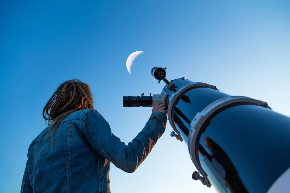 Observe the Moon through a telescope when it's not fully lit for a better view of craters and other lunar features. Credit: m-gucci / Getty Images