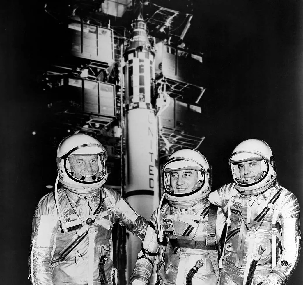 Mercury 7 astronauts John Glenn, Gus Grissom and Alan Shepard standing in front of the Redstone rocket. Credit: NASA