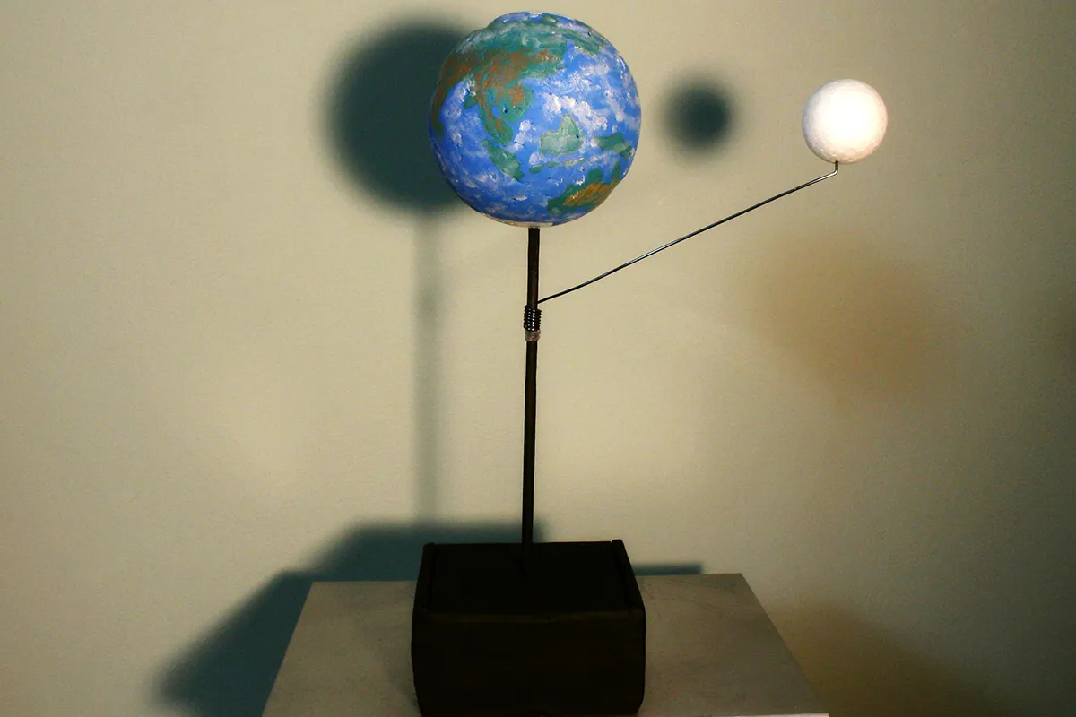 Create a model solar and lunar eclipse for a school science project. Credit: Mary McIntrye
