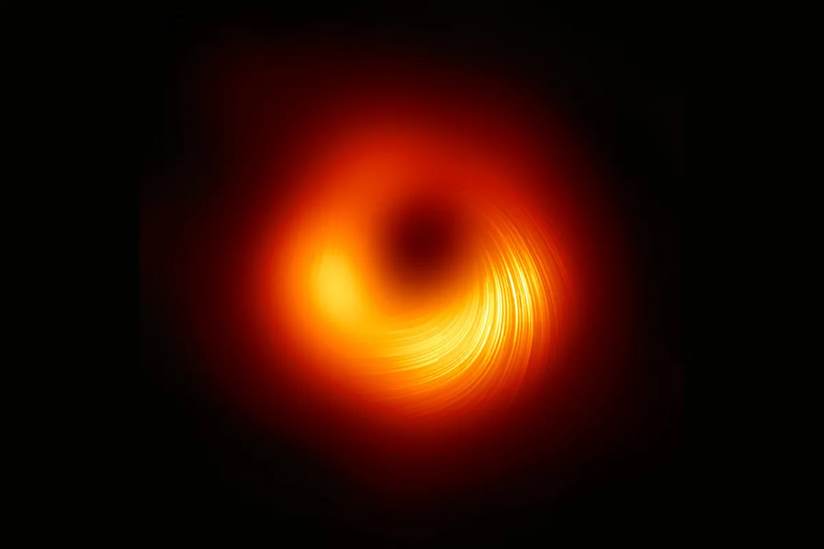  The black hole at the centre of galaxy M87 as it appears in polarised light. Credit: EHT Collaboration