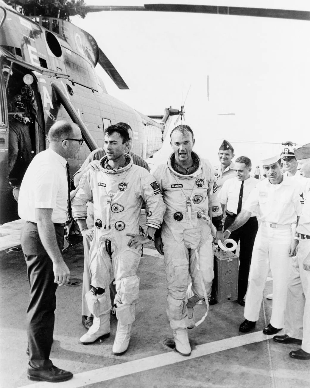 Astronauts John Young (left) and Michael Collins (right) on the recovery ship USS Guadalcanal on 21 July 1966, following successful splashdown of the Gemini 10 mission. Credit: NASA