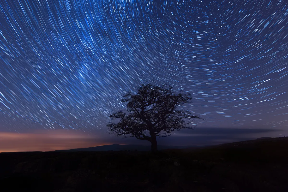 The stars appear to shift position due to Earth's orbit and rotation. Credit: Alexander W Helin / Getty Images
