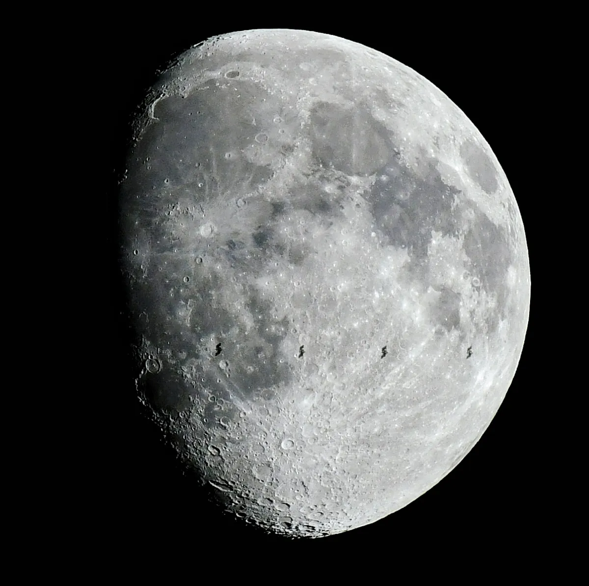 ISS crossing the Moon James Grandfield, Dublin, 24 March 2021. Equipment: Nikon D500 DSLR, Nikon 200–500mm lens