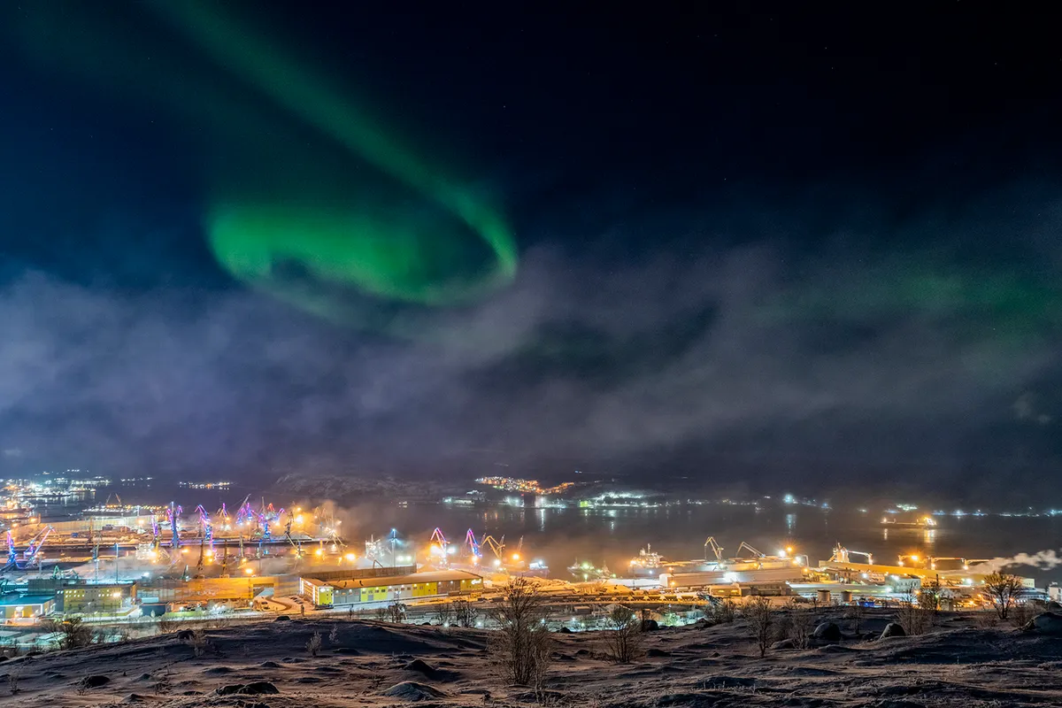 Aurora in Murmansk © Vitaliy Novikov (Russia) Kola Bay, Murmansk, Russia, 11 January 2020. Equipment: Nikon D850 camera, 24 mm f/5.6 lens, ISO 1000, 0.8-second exposure