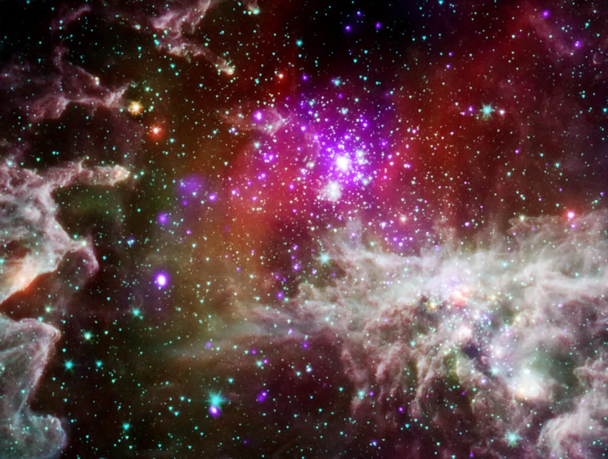 A Spitzer Space Telescope / Chandra X-ray telescope view of NGC 281, the Pacman Nebula. Credit: X-ray: NASA/CXC/CfA/S.Wolk; IR: NASA/JPL/CfA/S.Wolk