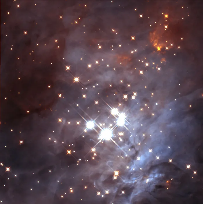 The Trapezium Cluster as seen in an infrared image captured by the Hubble Space Telescope. Credit: K.L. Luhman (Harvard-Smithsonian Center for Astrophysics, Cambridge, Mass.); and G. Schneider, E. Young, G. Rieke, A. Cotera, H. Chen, M. Rieke, R. Thompson (Steward Observatory, University of Arizona, Tucson, Ariz.) and NASA/ESA