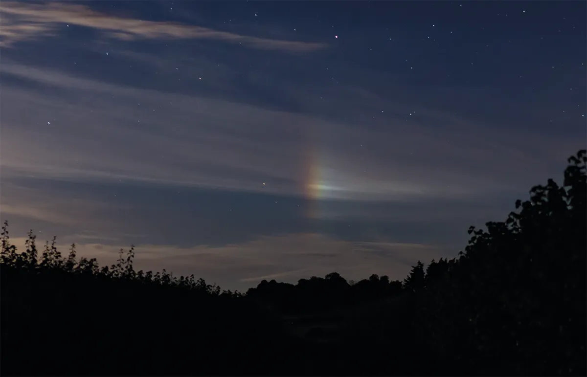 Moondogs are caused by ice crystals and appear as bright spots on the lunar halo. Credit: Will Gater.