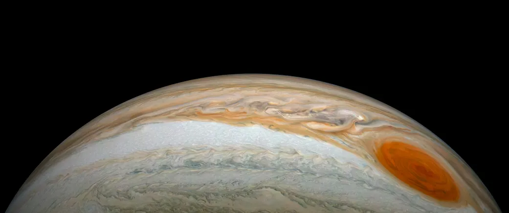 A view of the South Equatorial belt and the white Southern Tropical Zone on Jupiter. Right in the image is the famous Great Red Spot. This image was captured by the Juno spacecraft on 21 July 2019. Image data: NASA/JPL-Caltech/SwRI/MSSS / Image processing by Kevin M. Gill, licensed under CC by 3.0