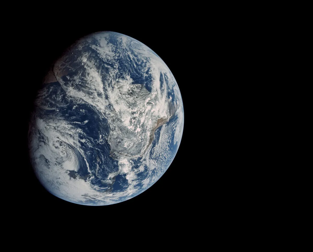 The moment human beings saw the disc of Earth against the blackness of space with their own eyes. This image was captured during Apollo 8, 21 December 1968. Credit: NASA / restored by Toby Ord