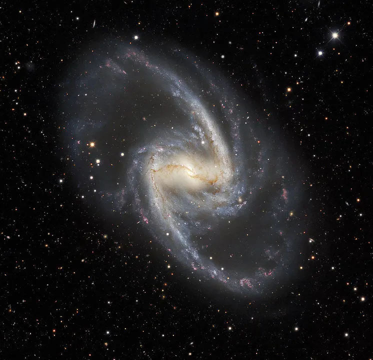 The Great Barred Spiral Galaxy, NGC 1365, in the Fornax cluster, VÍCTOR M. BLANCO 4-METER TELESCOPE, 7 JULY 2021. IMAGE CREDIT: Dark Energy Survey/DOE/FNAL/DECam/CTIO/NOIRLab/NSF/AURA Image processing: Travis Rector (University of Alaska Anchorage/NSF’s NOIRLab), Jen Miller (Gemini Observatory/NSF’s NOIRLab), Mahdi Zamani & Davide de Martin (NSF’s NOIRLab)