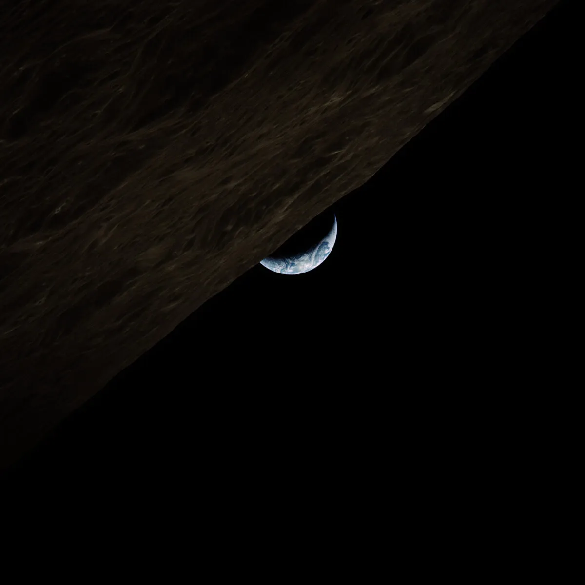 Apollo 17 was the last crewed mission to the Moon, or as astronaut Gene Cernan would have put it, the 'most recent' crewed mission to the Moon. This crescent earthrise was captured on 16 December 1972. Credit: NASA / restored by Toby Ord