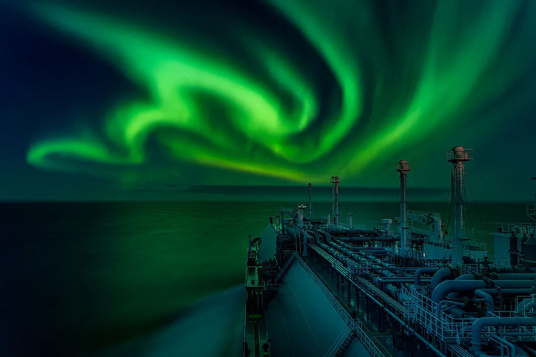 Polar Lights Dance, by Dmitrii Rybalka (Russia). Winner, Aurorae. Approach to the Kara Strait, Russia, 30 November 2020. Equipment: Sony ILCE-7M3 camera, 28 mm f/2.8 lens.