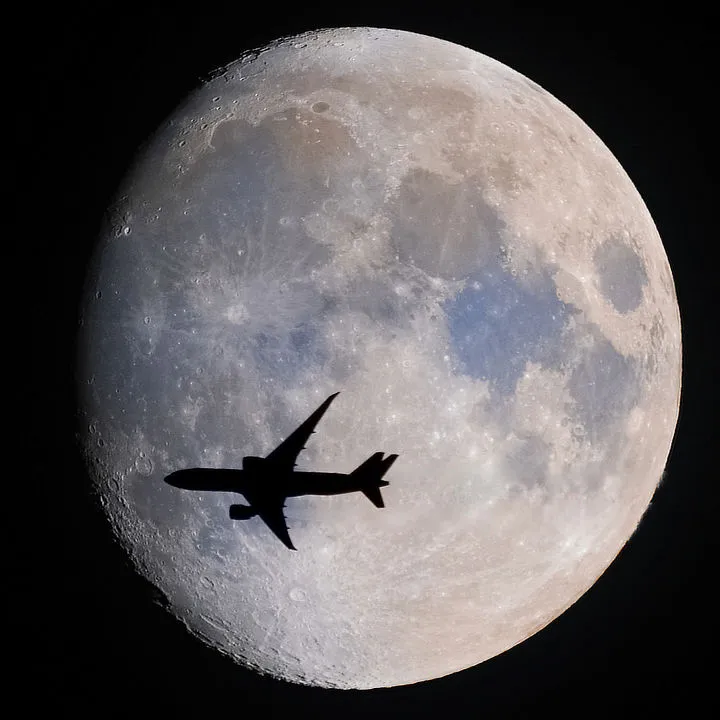 Plane transiting mineral Moon Soumyadeep Mukherjee, Kolkata, India, 21 July 2021 Equipment: Nikon D5600 DSLR, Sigma 150–600mm lens