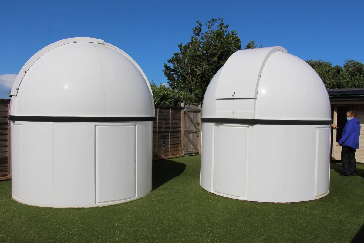 Two Pulsar observatory domes during the day