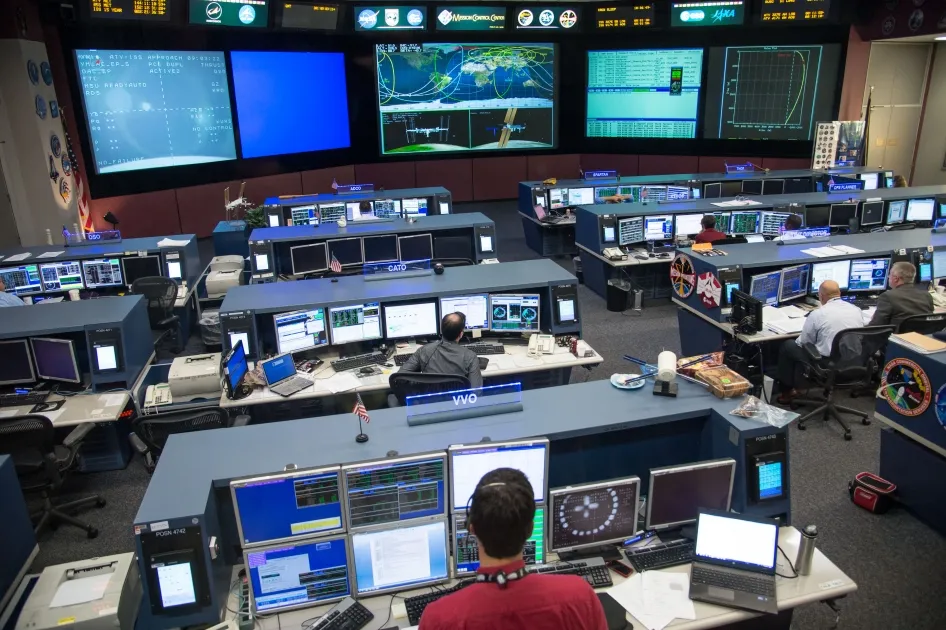 Mission Control teams on the ground make sure space operations run smoothly. Credit: NASA