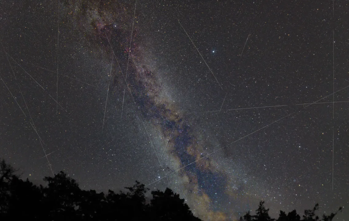 Satellite sky Adam Gray, New Forest, Hampshire, 13 August 2021 Equipment: Canon 2000D DSLR, Samyang 14mm lens, Sky-Watcher Star Adventurer 2i