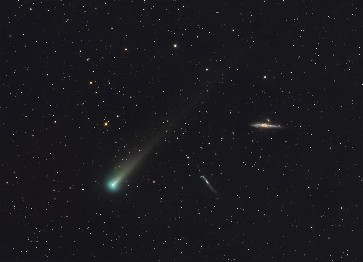 Comet Leonard passing the Whale and Hockey Stick Galaxies by Tom Masterson & Terry Hancock, Grand Mesa Observatory, Purdy Mesa, Colorado, USA, 25 November 2021. Equipment: QHY367 Pro C One shot Color CMOS, Takahashi E-180 Astrograph, 116 x 60 second.