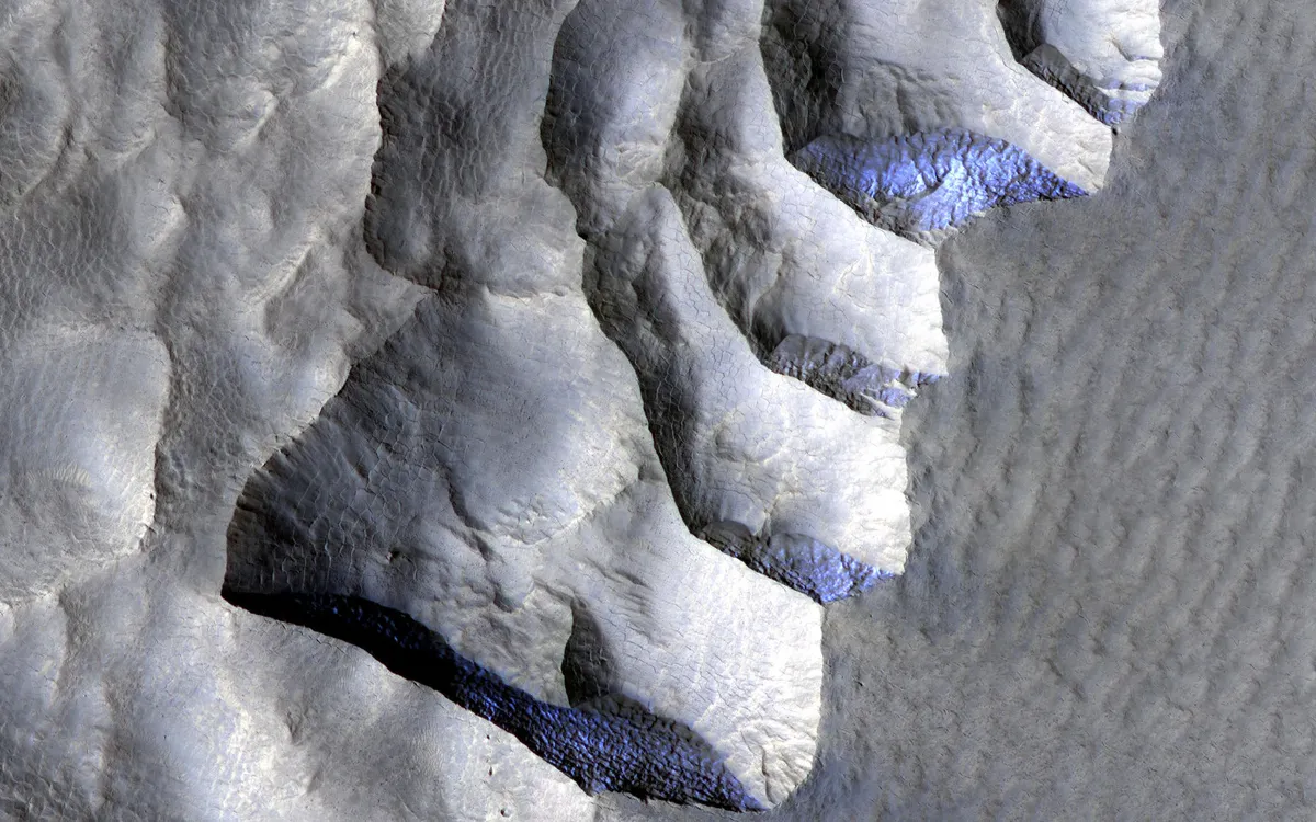 Ice cliffs on Mars MARS RECONNAISSANCE ORBITER, 21 JANUARY 2022 IMAGE CREDIT: NASA/JPL-Caltech/University of Arizona