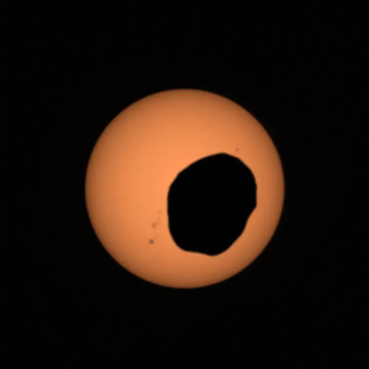 A view of a total solar eclipse on Mars. NASA's Perseverance rover captured this image of Mars's moon Phobos passing in front of the Sun on 20 April 2022. Credit: NASA/JPL-Caltech/ASU/MSSS/SSI