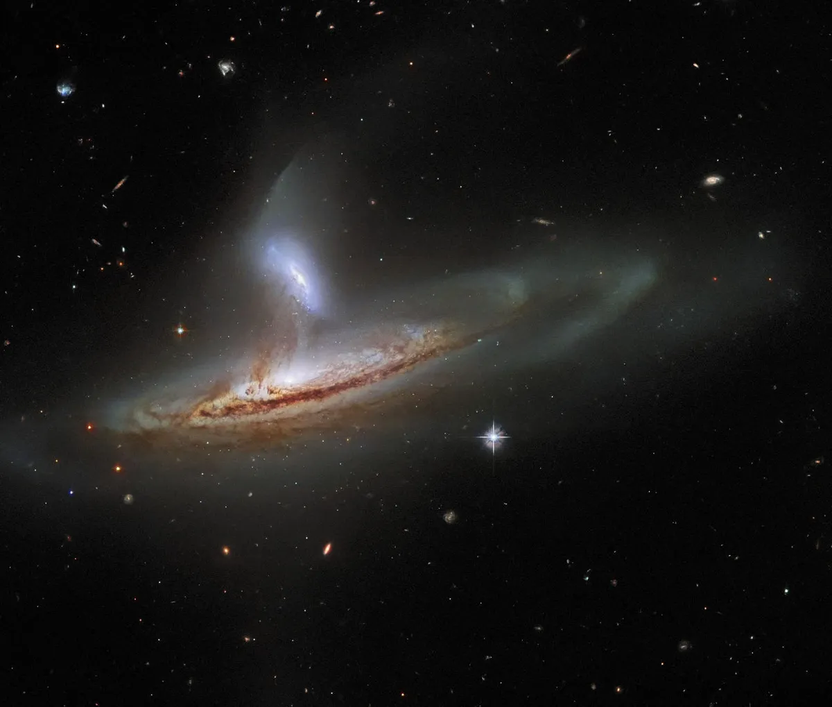 Arp 282: Seyfert galaxy NGC 169 (bottom) interacting with galaxy IC 1559 (top) HUBBLE SPACE TELESCOPE, 7 FEBRUARY 2022 IMAGE CREDIT: ESA/Hubble & NASA, J. Dalcanton, Dark Energy Survey, DOE, FNAL/DECam, CTIO/NOIRLab/NSF/AURA, SDSS Acknowledgement: J. Schmidt