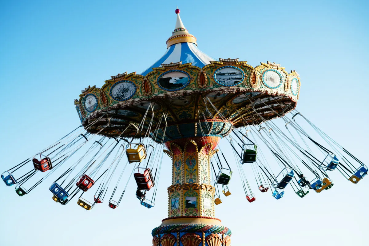 The centrifugal force of a chairoplane is a simple way of understanding how a planet's spin causes it to bulge, so it's not perfectly round. Credit: Andrew Williams / EyeEm / Getty