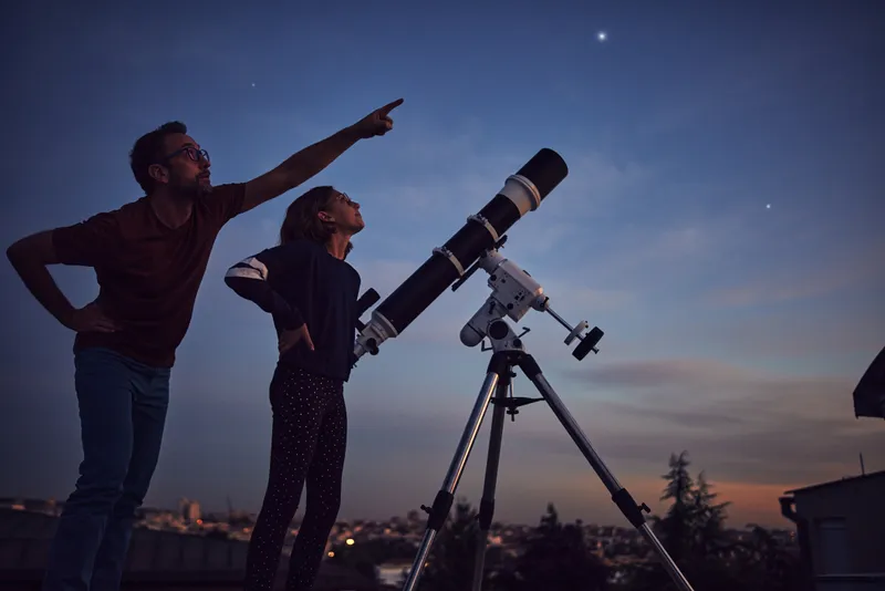 Stargazing is a great way of getting children interested in science and astronomy. Credit: M Gucci / Getty Images