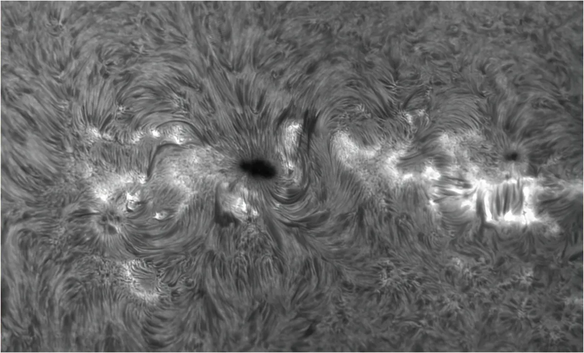 Sunspots Arturo Buenrostro, Dallas, Texas, 27 March 2022 Equipment: ZWO ASI178MM camera, Lunt 60mm H-Alpha telescope, double-stack 50mm filter, B1200 blocking filter, Sky-Watcher AZ-EQ6 Pro mount