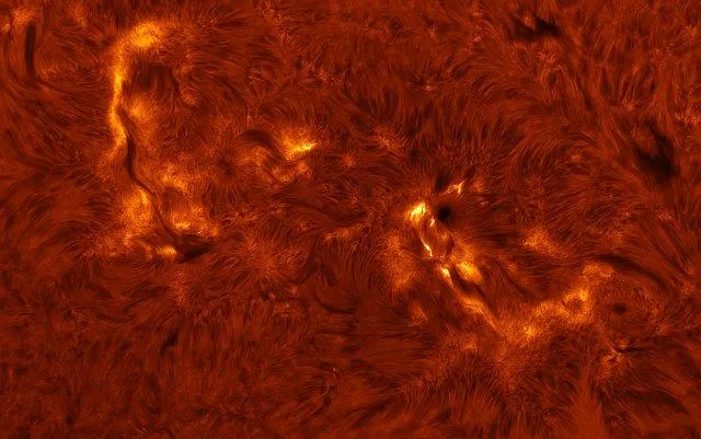 Solar Inferno by Stuart Green, Preston, Lancashire, UK. Category: Our Sun. Equipment: Basler acA1920-155um camera, 5100 mm f/34, 2,500 x 0.02-second exposures (50-second total exposure). Using a home-built telescope fitted with a Lunt 35 H-alpha etalon filter.
