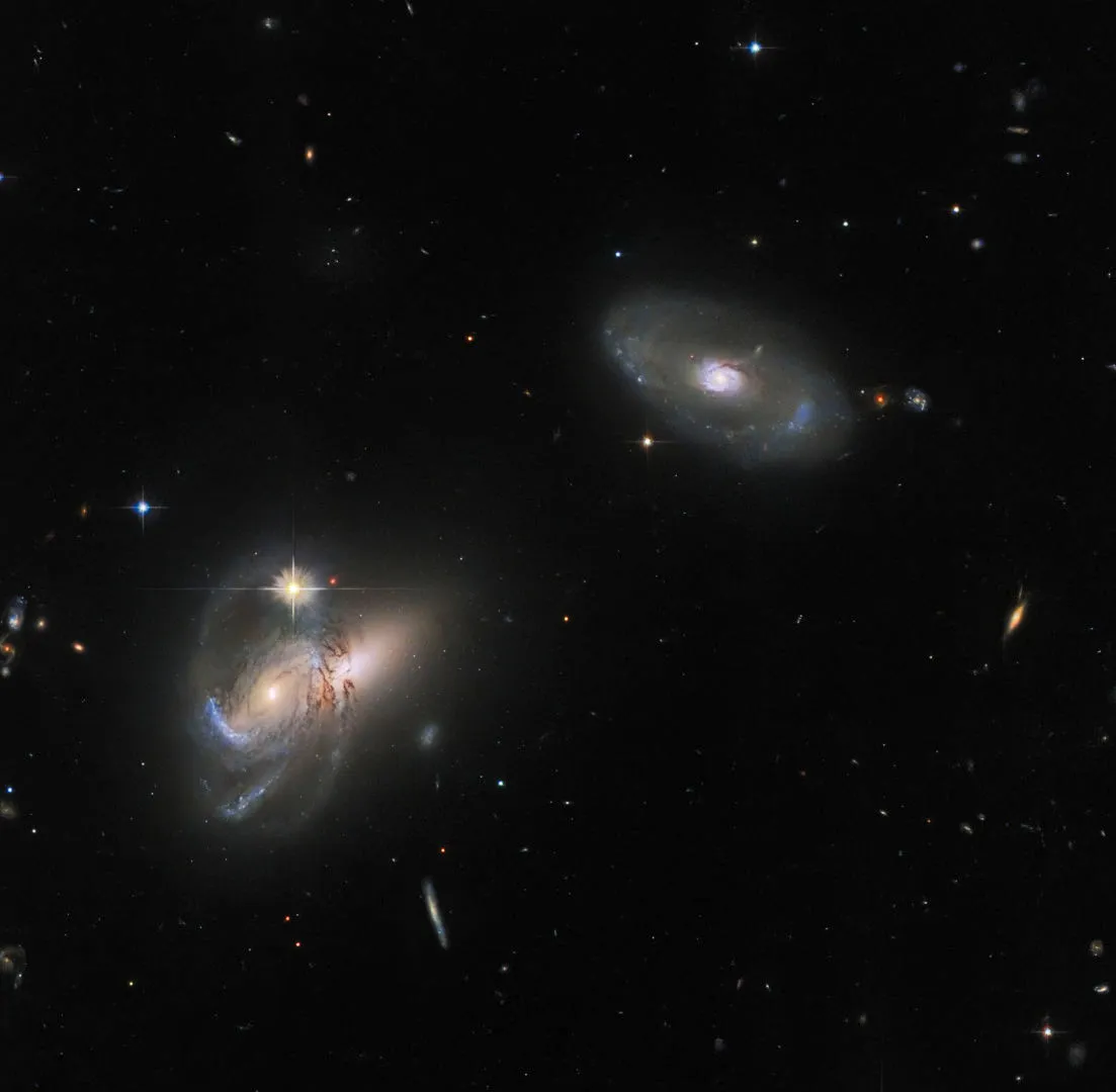 Two galaxies and an active galactic nucleus in Hercules Hubble Space Telescope, July 2022 Credit: ESA/Hubble & NASA, W. Keel