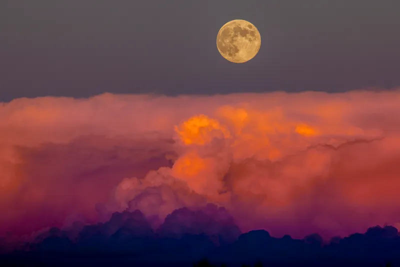 Harvest Moon rising above storm clouds, western Colorado, USA. Credit: Doug Meek