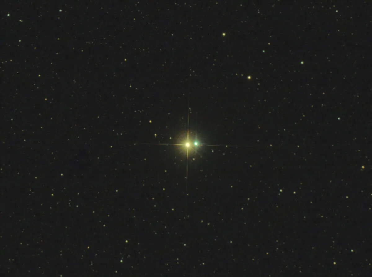 Double star Albireo is likely not a 'true' binary star, but rather an 'optical' binary. The stars don't orbit each other: they just appear close together from our perspective on Earth. Credit: Tony Moss